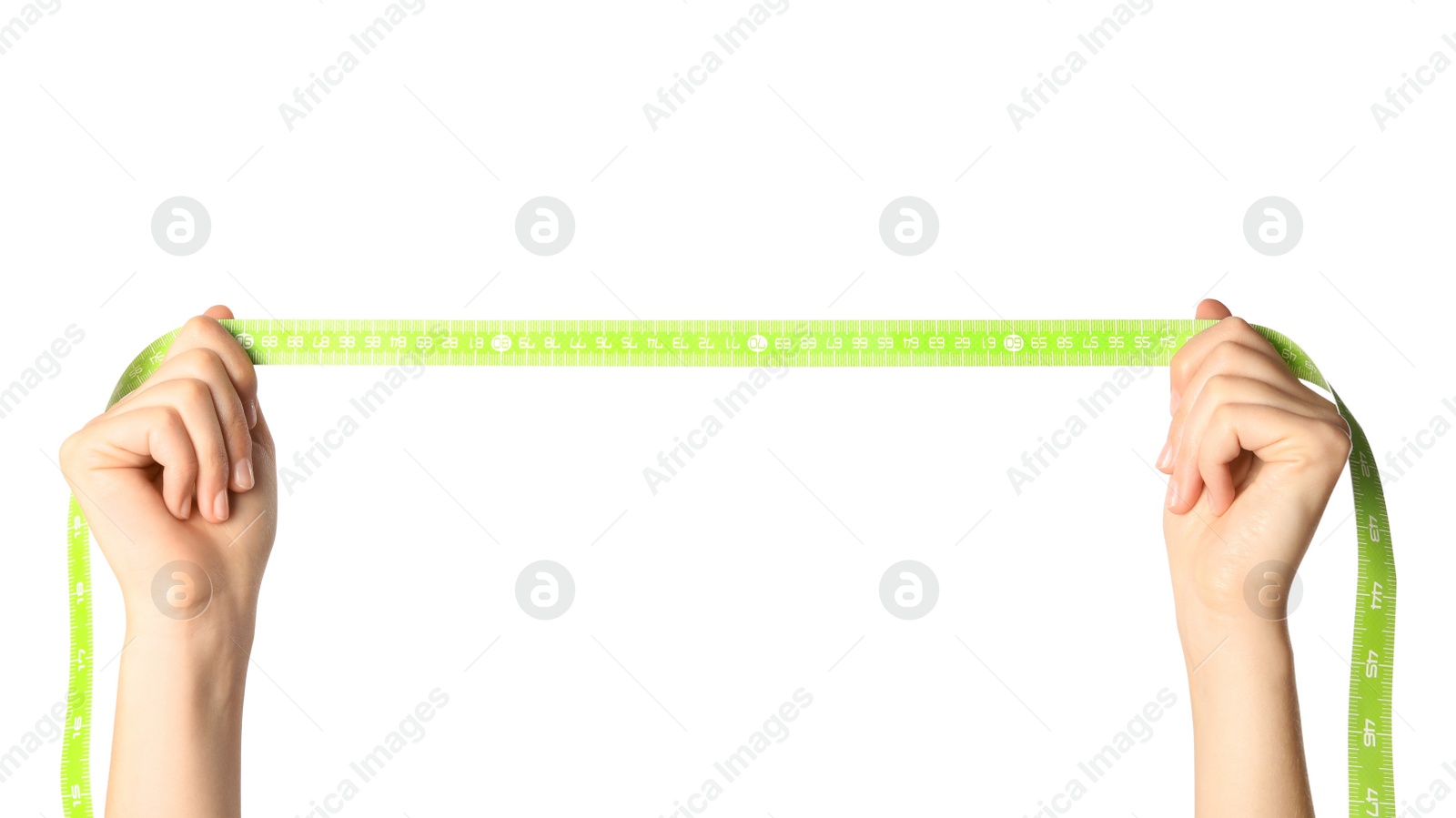 Photo of Woman holding green measuring tape on white background, closeup