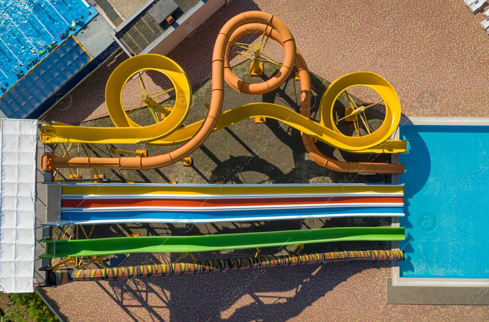 Image of Aerial view of water park on sunny day