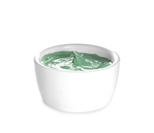 Photo of Freshly made spirulina facial mask in bowl on white background