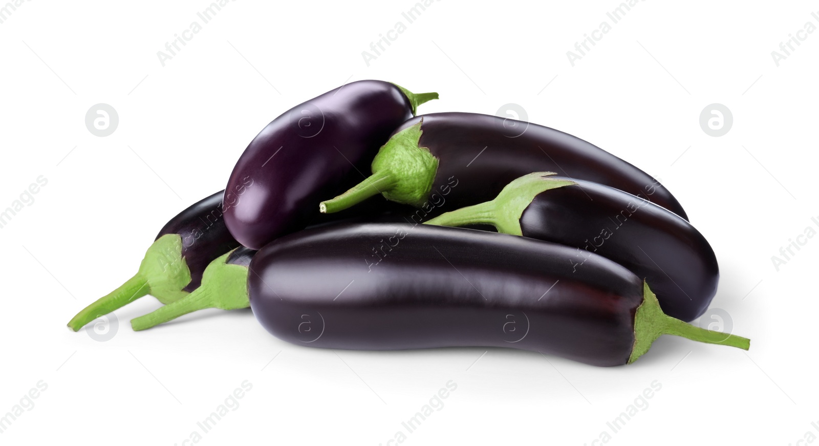 Photo of Pile of raw ripe eggplants isolated on white