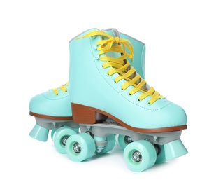 Photo of Pair of bright stylish roller skates on white background