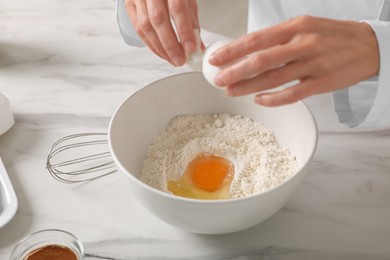 Professional chef making dough at white marble table indoors, closeup