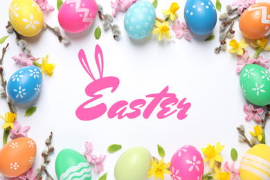 Flat lay composition with bright eggs and word Easter on white background, flat lay