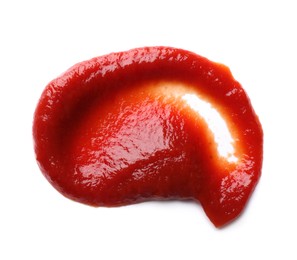 Photo of Smear of tasty ketchup isolated on white, top view