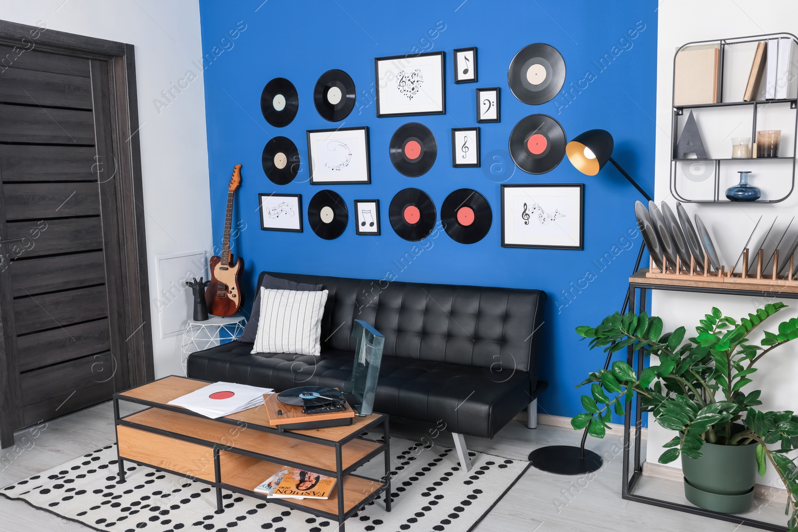 Photo of Living room decorated with vinyl records. Interior design