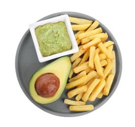 Plate with delicious french fries and avocado dip isolated on white, top view