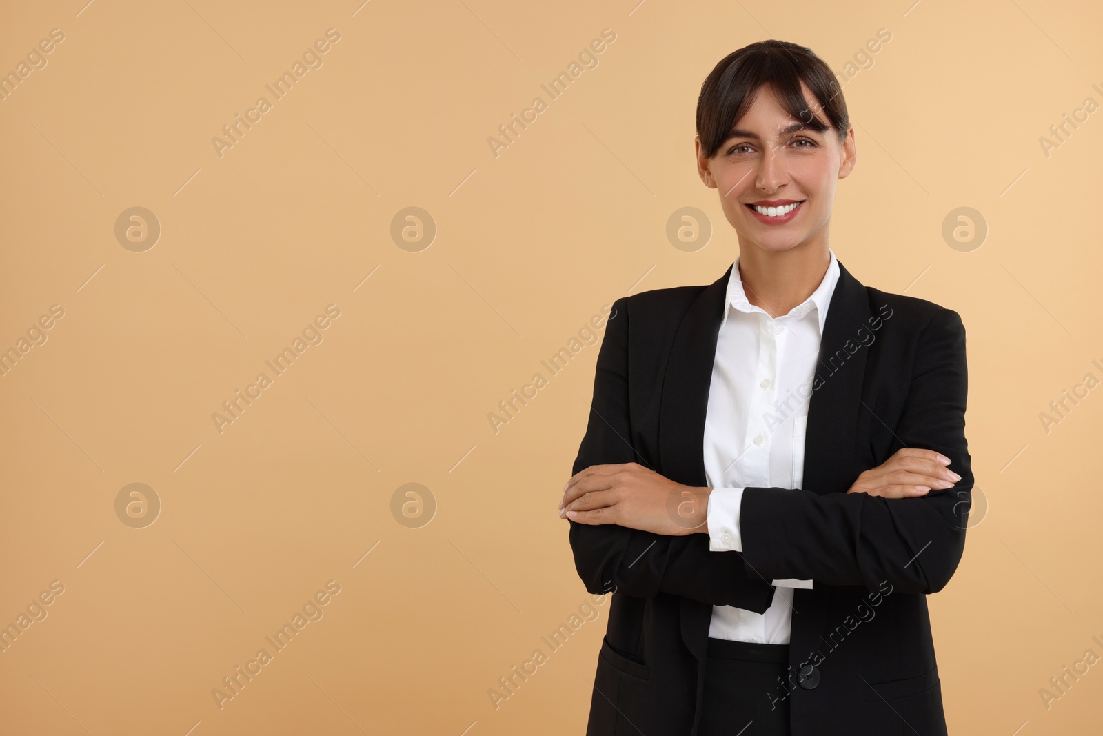 Photo of Portrait of happy secretary on beige background. Space for text