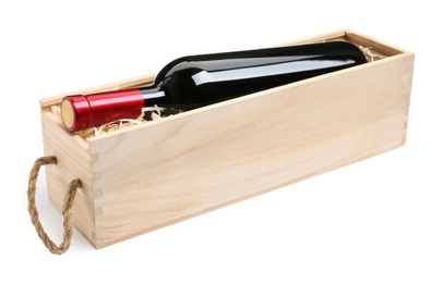 Open wooden crate with bottle of wine isolated on white