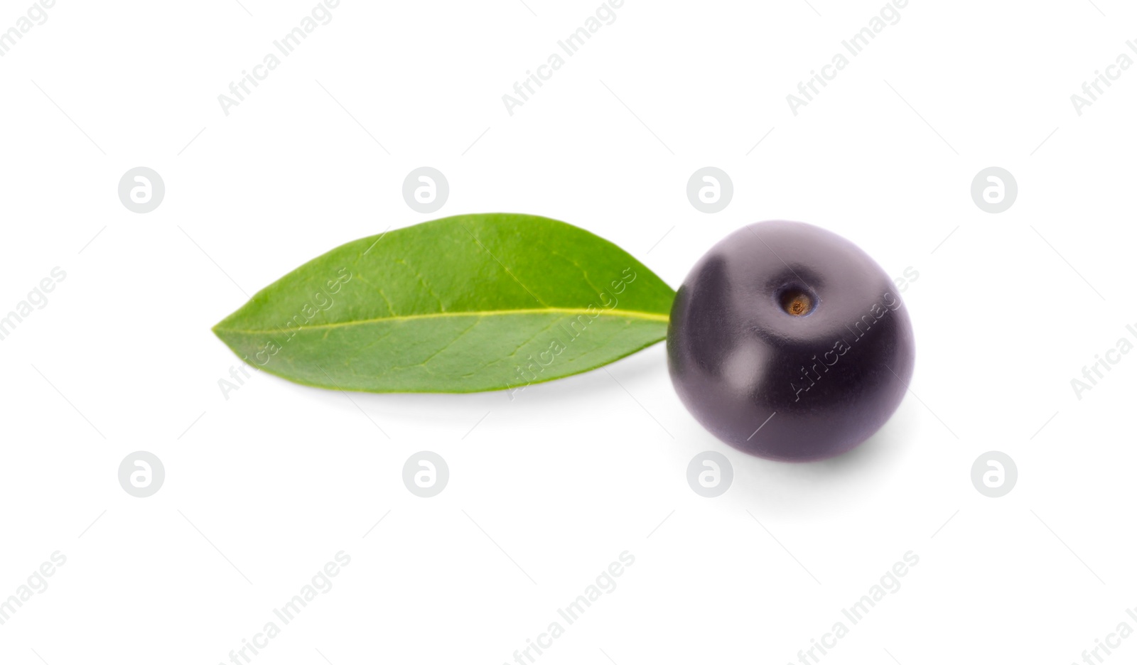 Photo of Fresh ripe acai berry with leaf isolated on white
