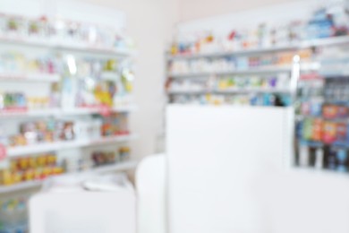 Pharmacy interior with different pharmaceuticals, blurred view