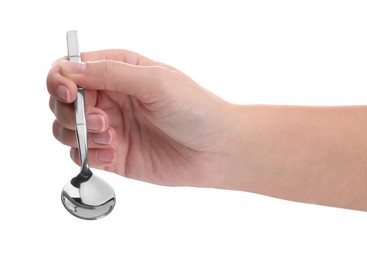 Woman holding new shiny spoon on white background, closeup