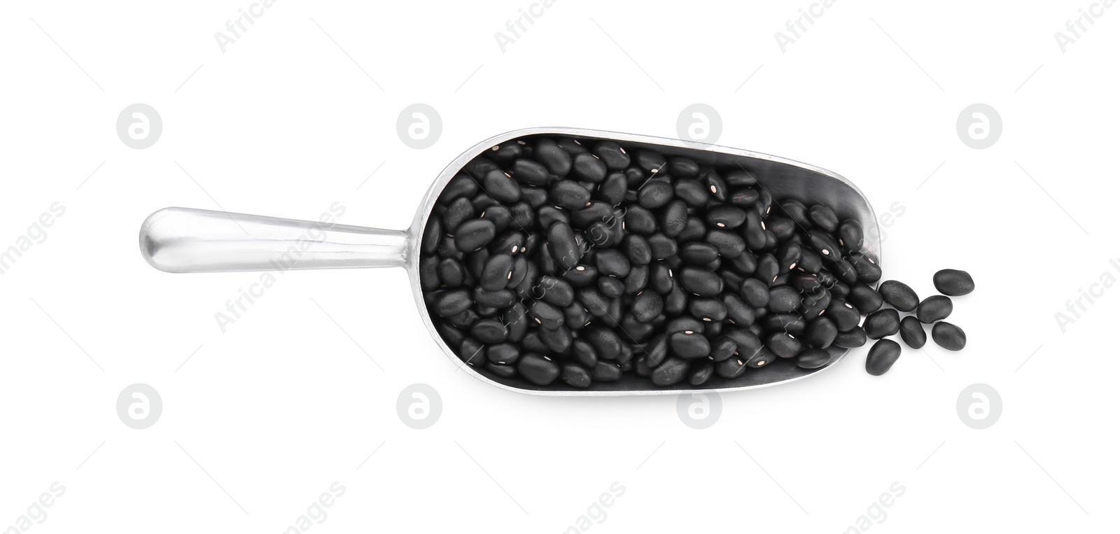 Photo of Scoop with raw kidney beans isolated on white, top view