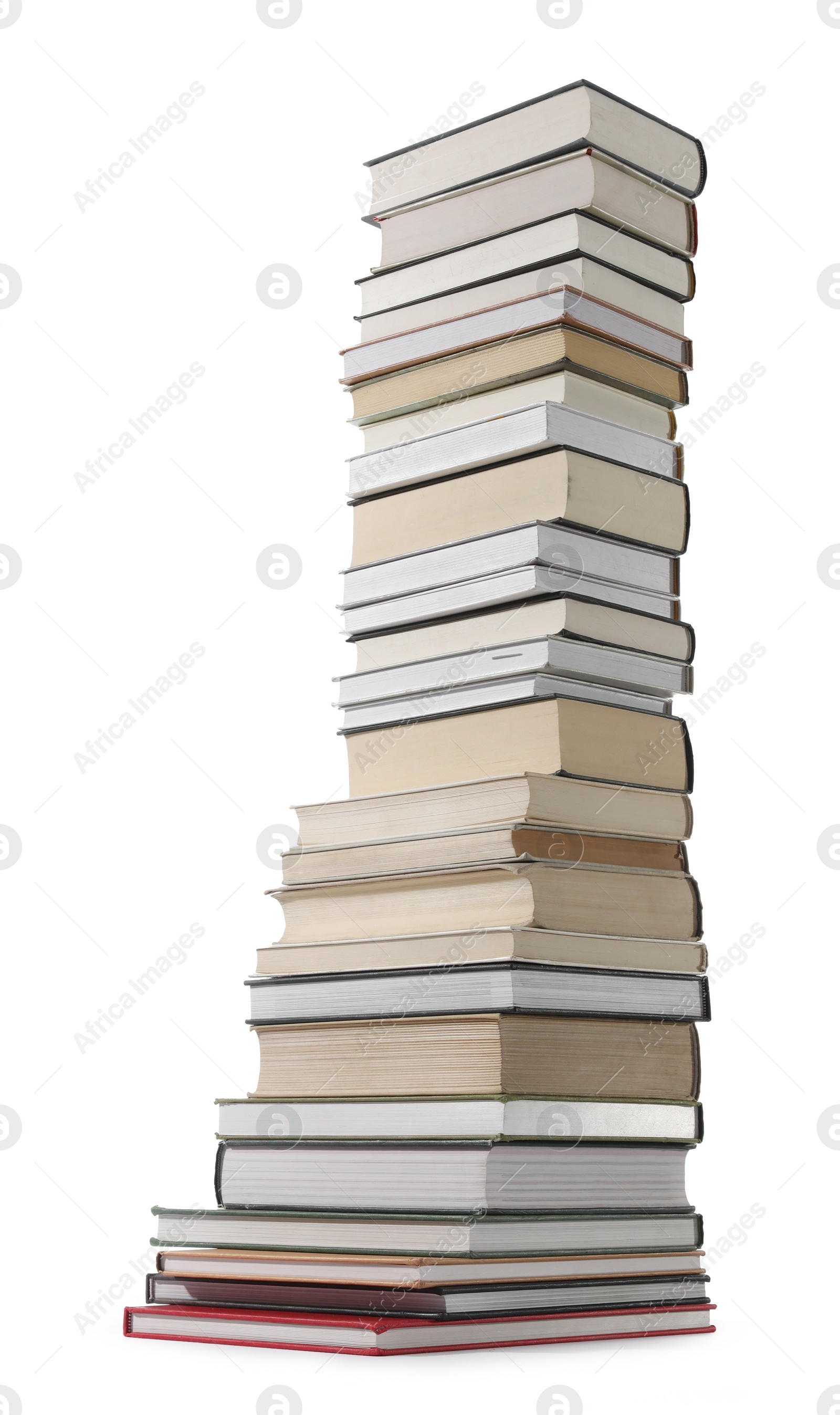 Photo of High stack of many different books isolated on white