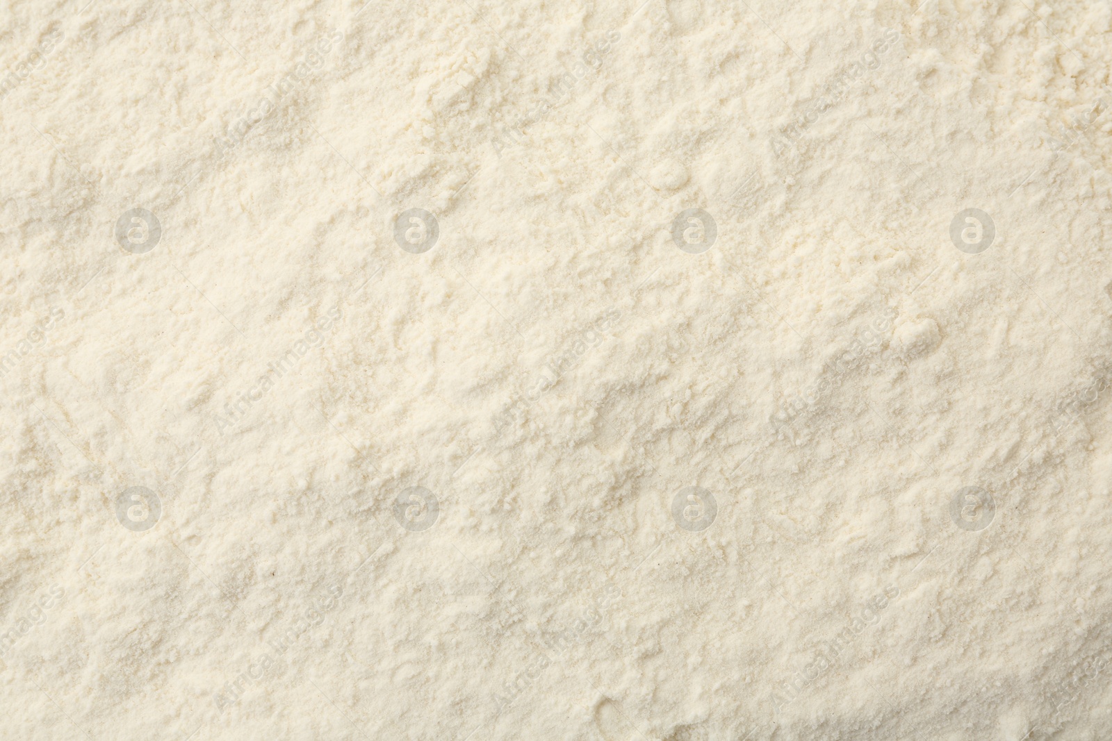 Photo of Texture of baking powder as background, top view