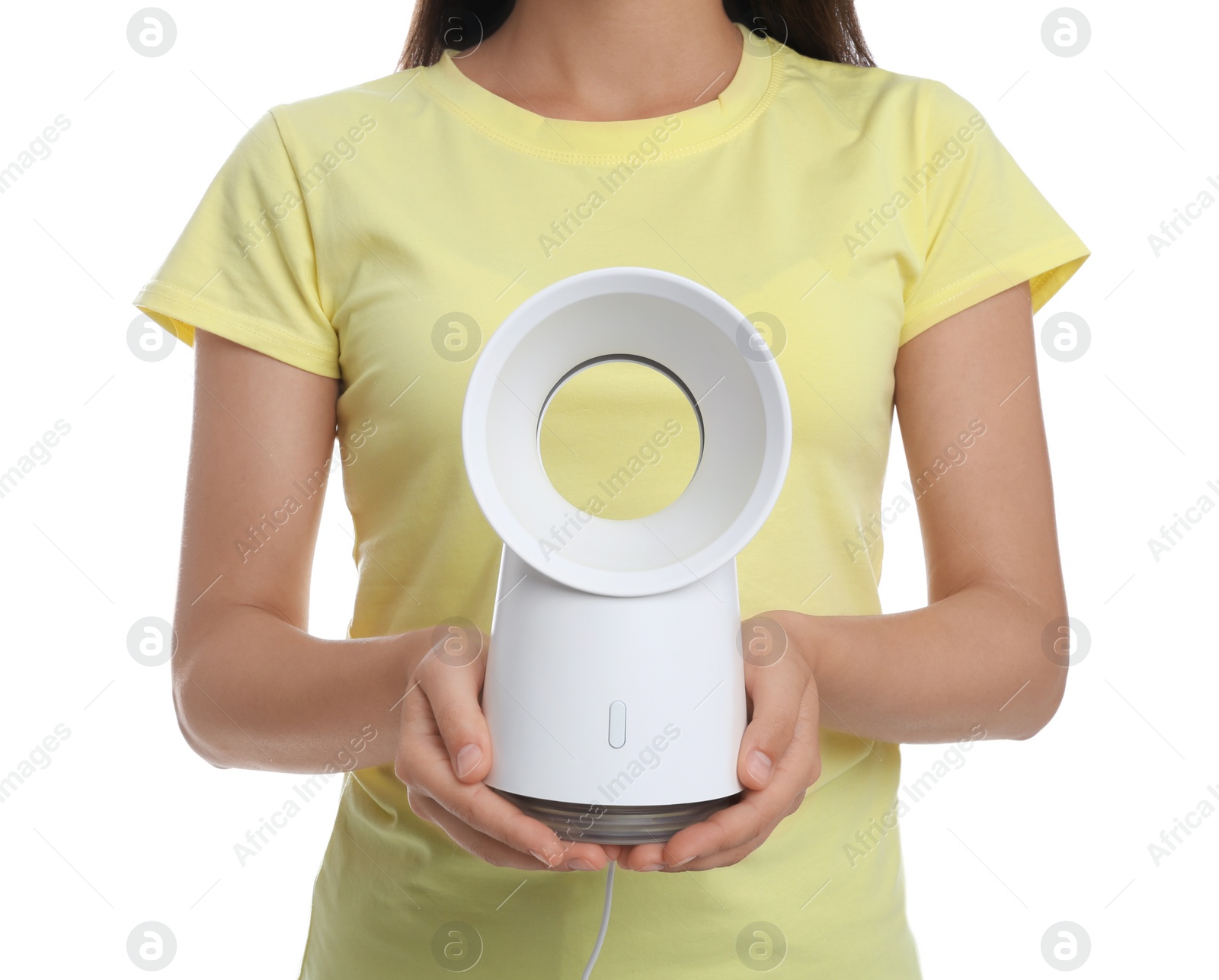 Photo of Woman with portable fan on white background, closeup. Summer heat