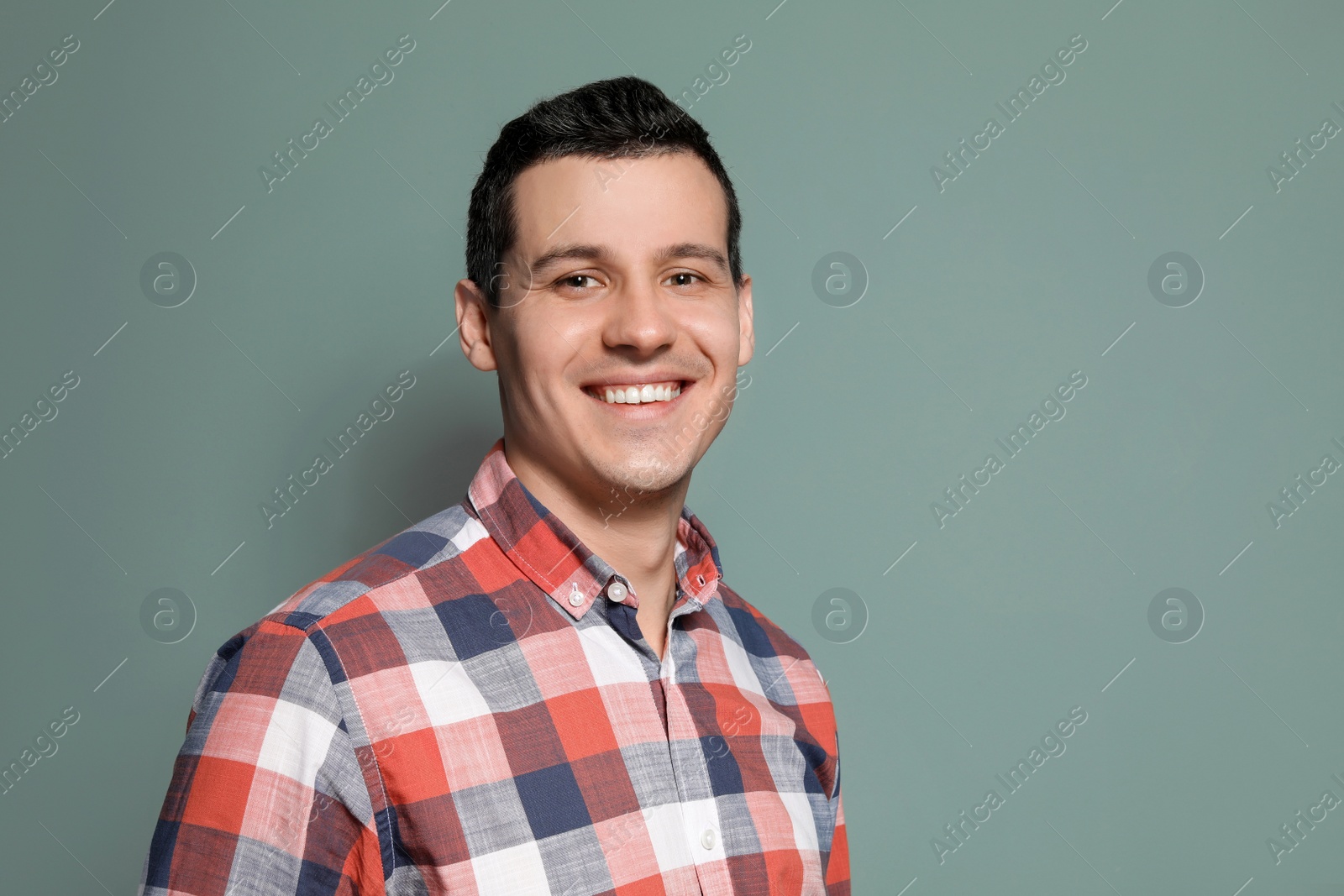 Photo of Portrait of confident man on color background