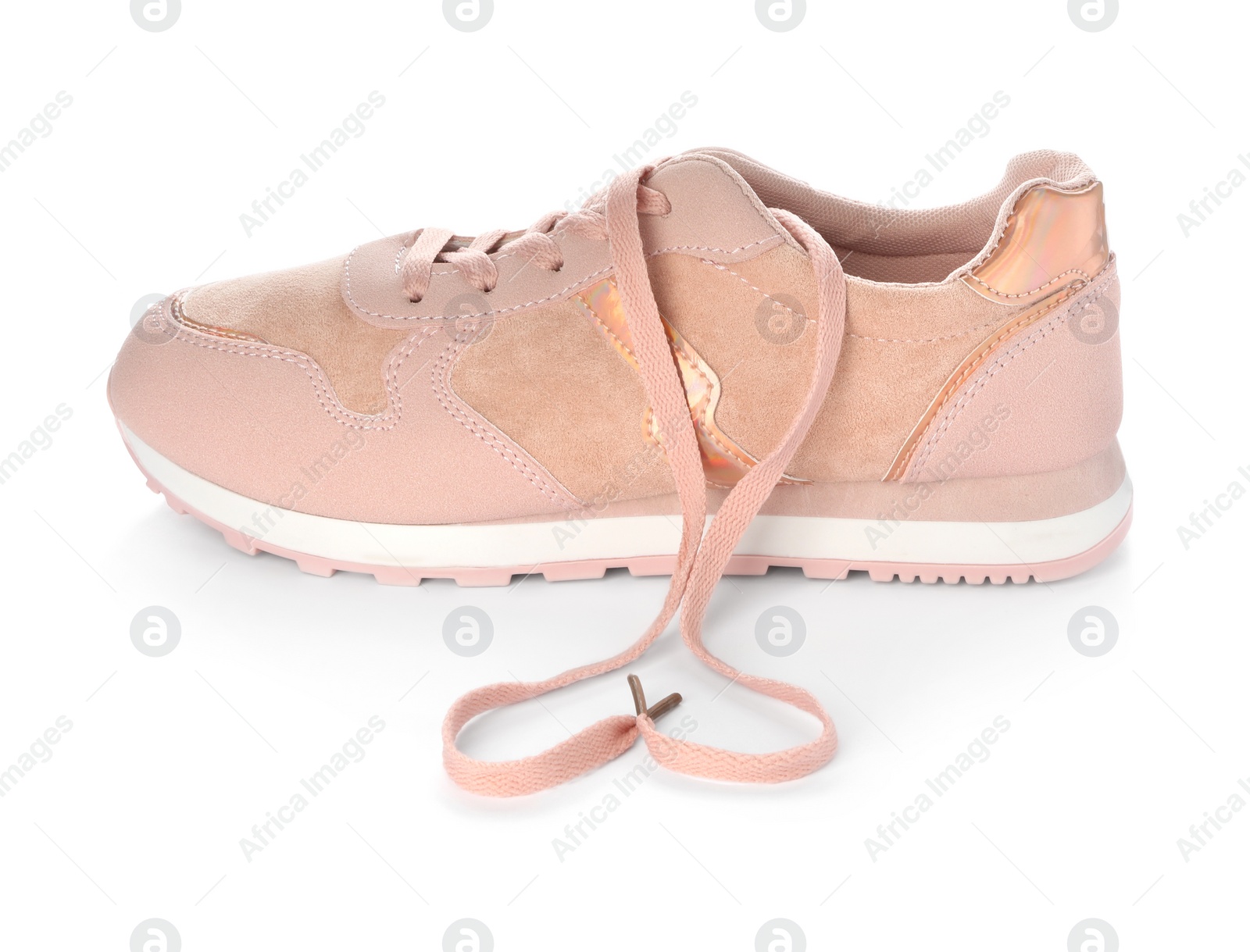 Photo of Stylish pink sneaker with shoelaces on white background