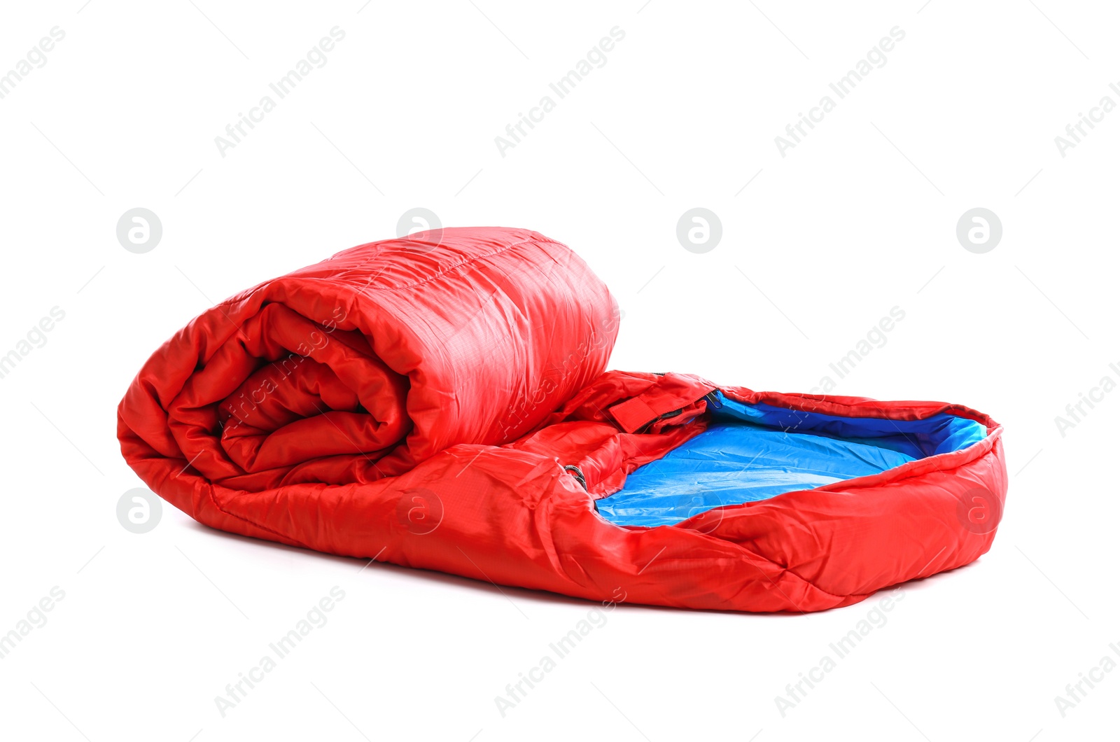 Photo of Rolled sleeping bag on white background. Camping equipment