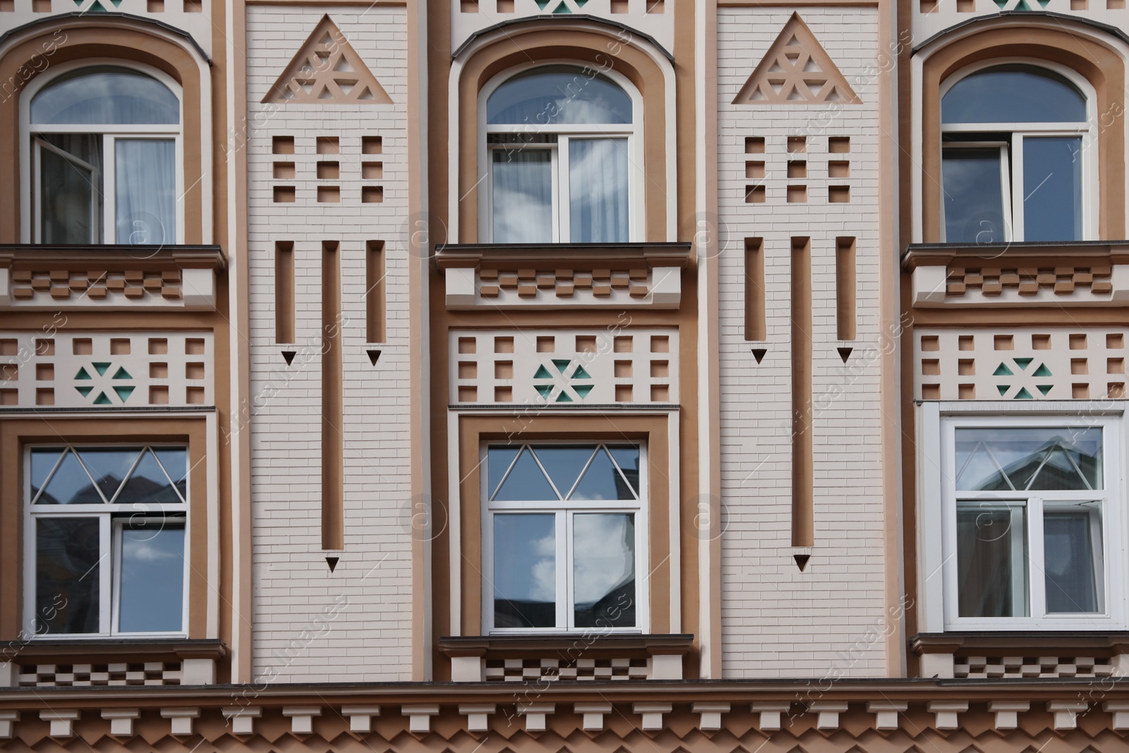 Photo of Wall of vintage building with beautiful windows