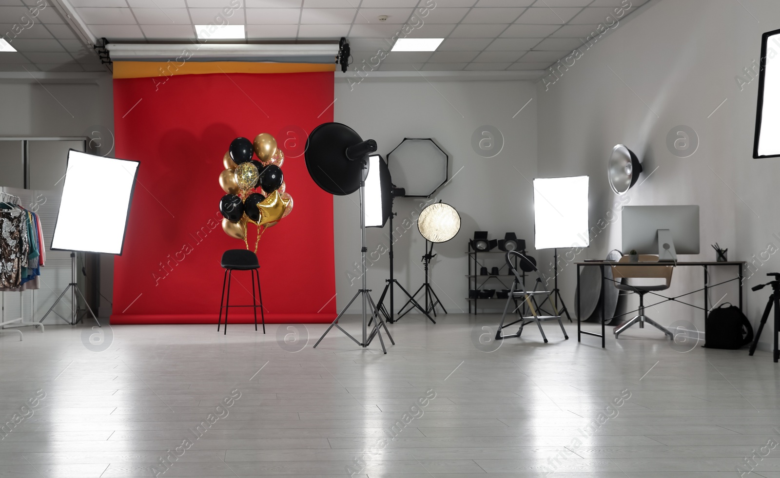 Photo of Interior of modern photo studio with professional equipment