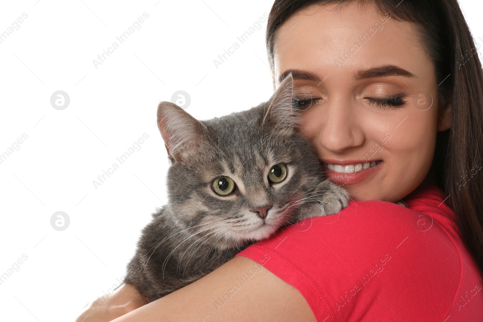 Photo of Young woman with cute cat on white background. Pet and owner