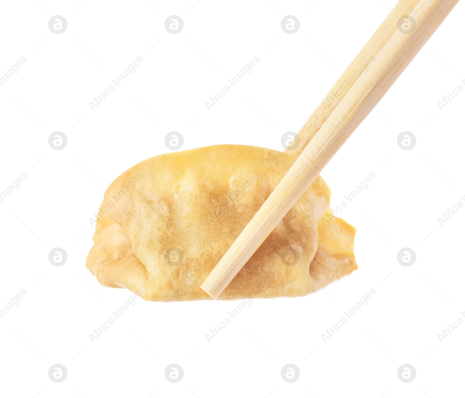 Photo of Chopsticks with delicious gyoza (asian dumpling) isolated on white