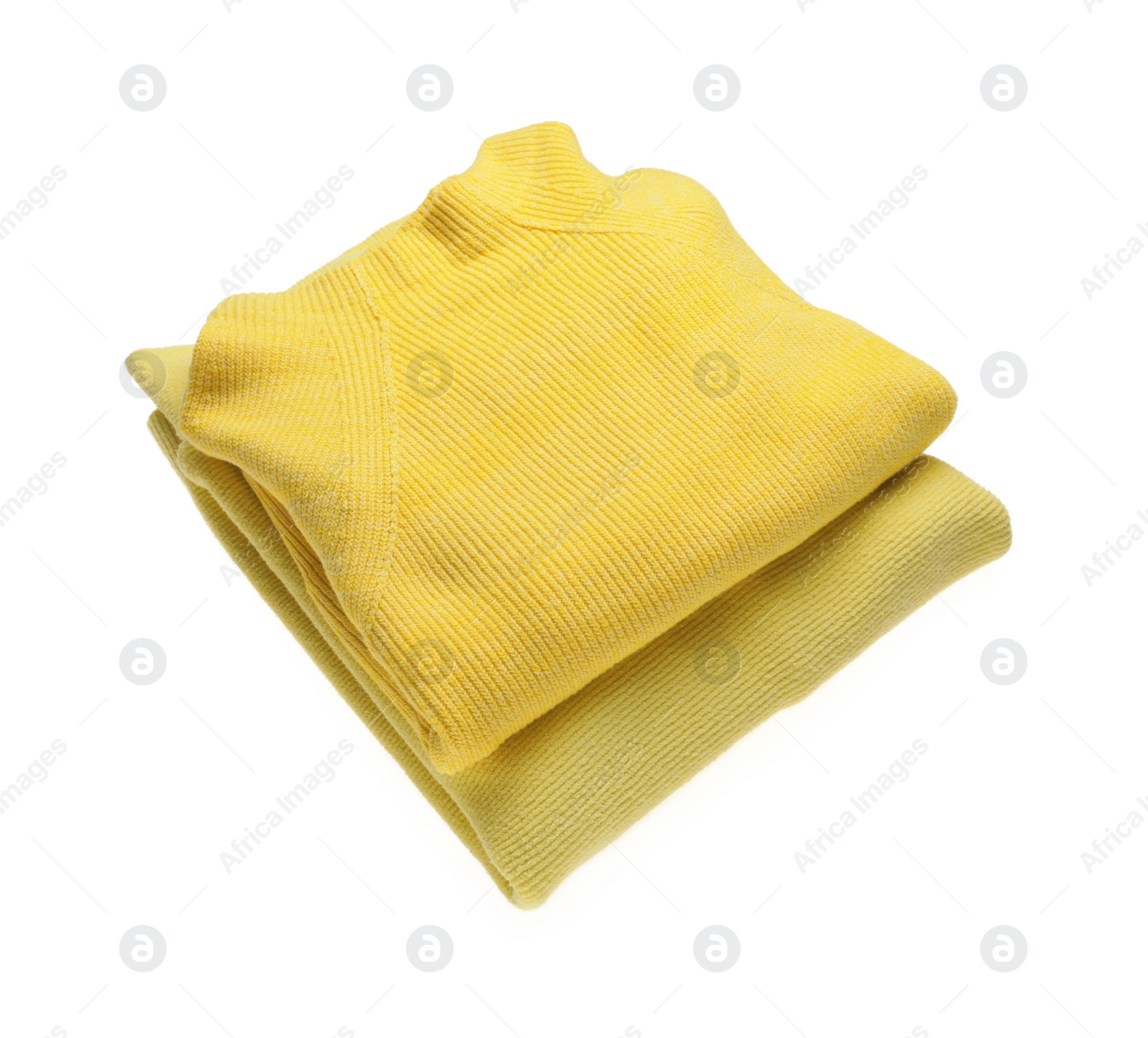 Photo of Yellow woolen sweaters on white background. Warm clothes