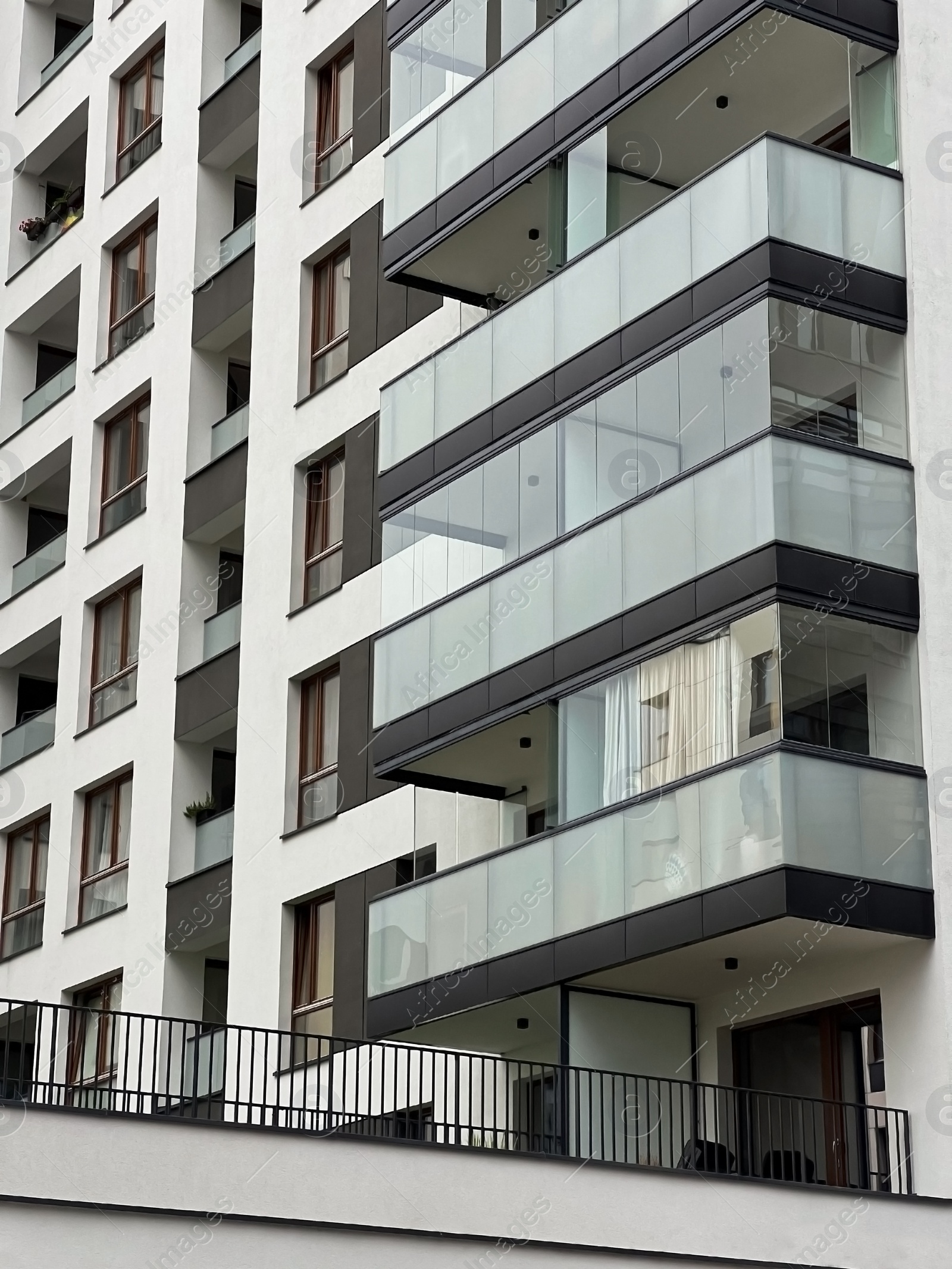 Photo of Exterior of modern residential building with balconies