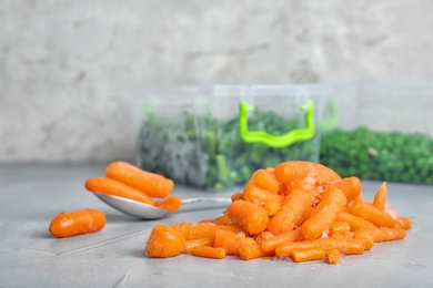 Photo of Frozen carrots on table. Vegetable preservation