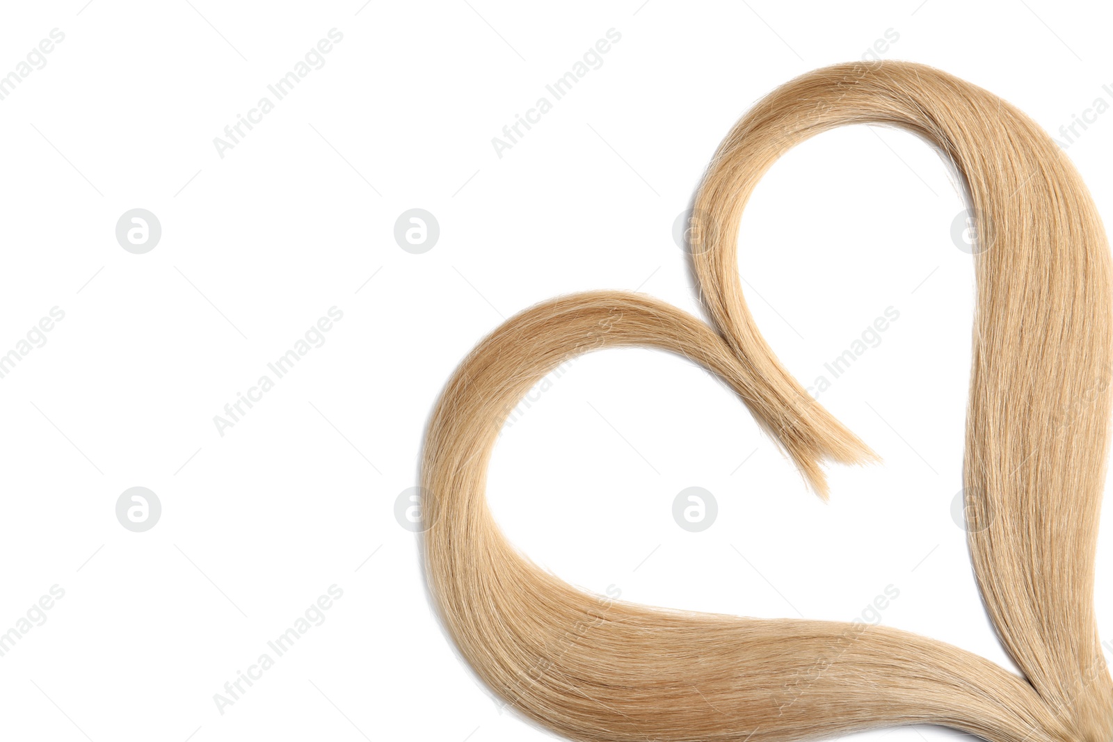 Photo of Heart made of blond hair locks on white background