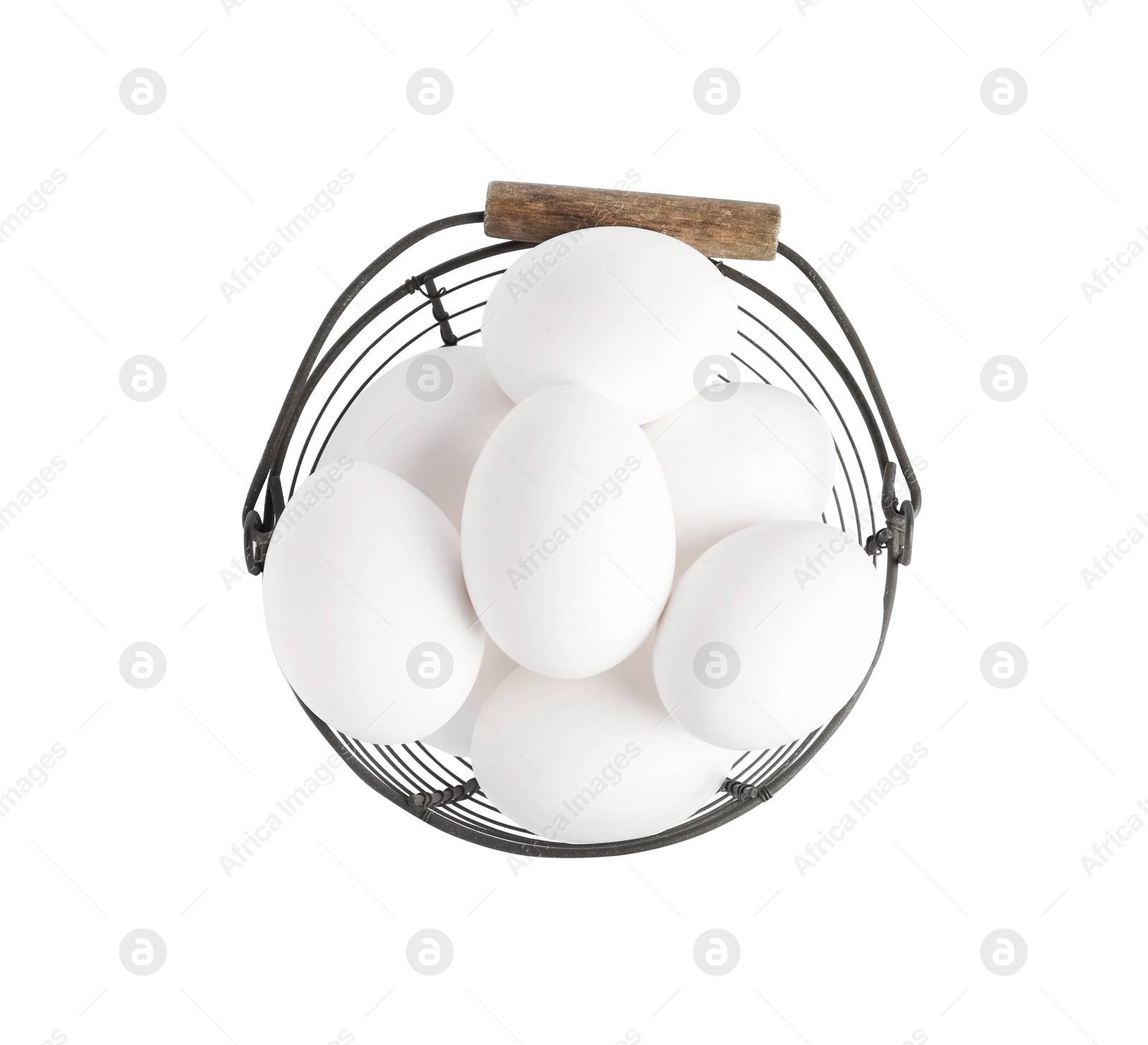 Photo of Chicken eggs in metal basket isolated on white, top view