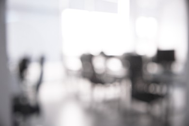 Image of Office interior. Blurred view of comfortable workspace