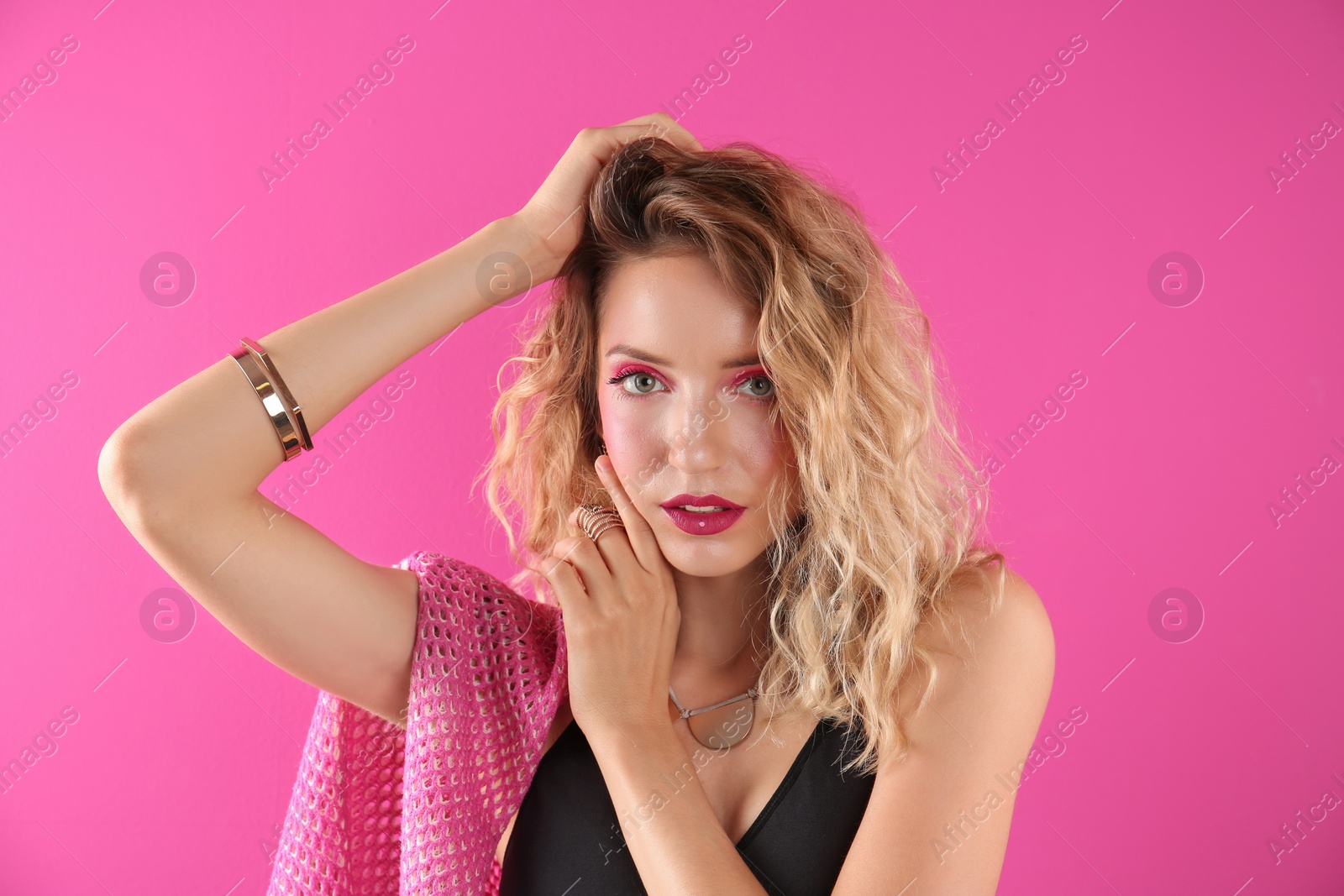 Photo of Beautiful young woman posing on color background. Summer fashion