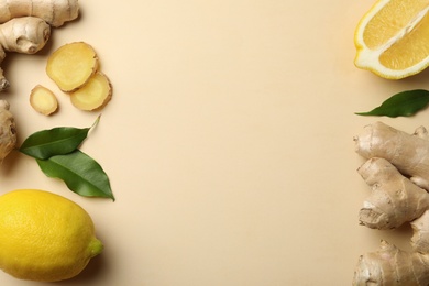 Photo of Fresh lemons and ginger on beige background, flat lay. Space for text