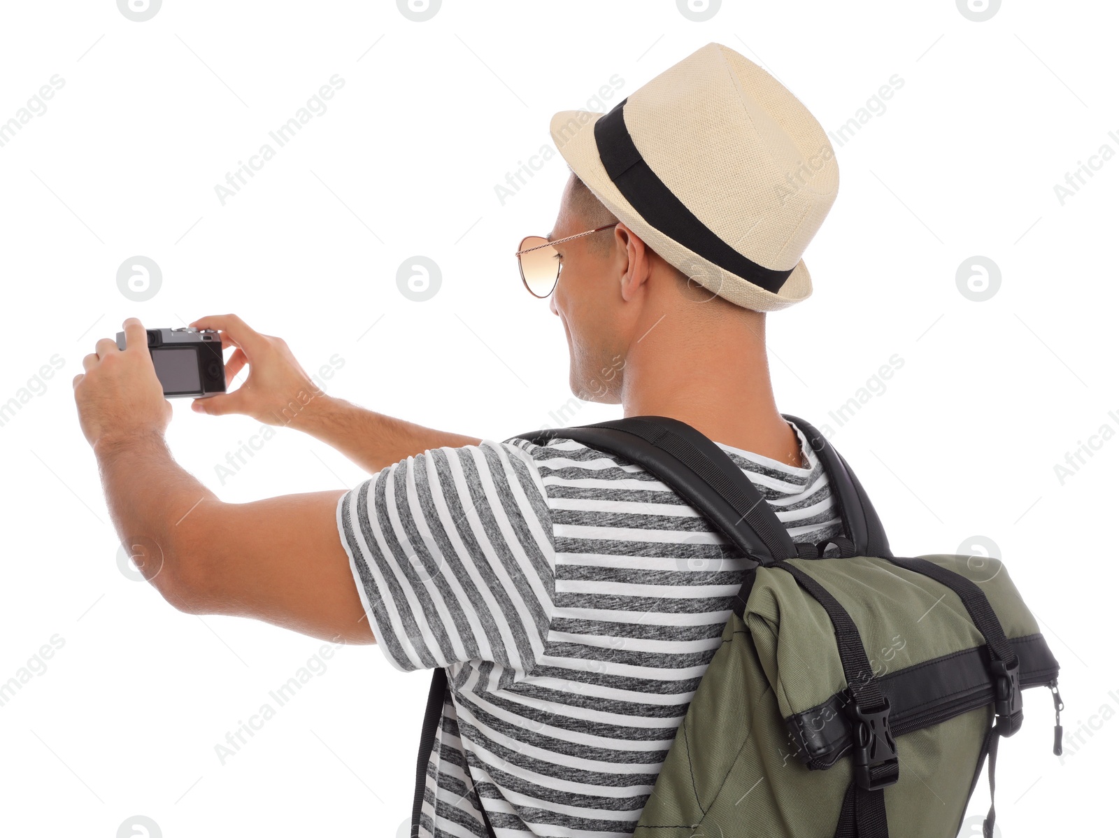 Photo of Man with straw hat taking picture on white background. Summer travel