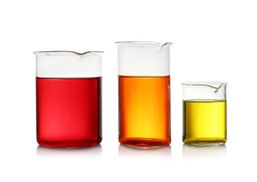 Photo of Beakers with color liquid isolated on white. Solution chemistry