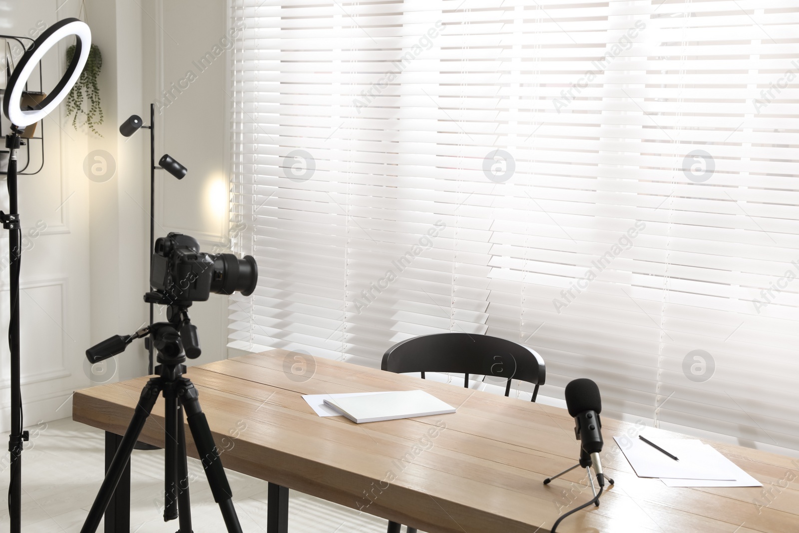 Photo of Ring light, camera and microphone for blogging in room