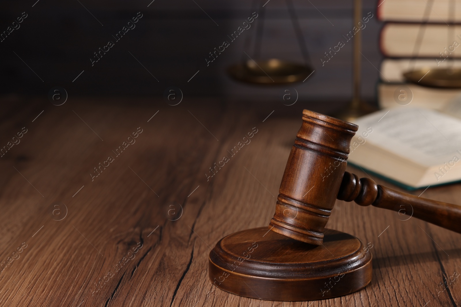 Photo of Law concept. Judge's gavel on wooden table, space for text