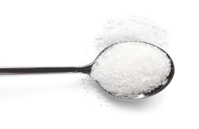 Spoon and granulated sugar isolated on white, top view