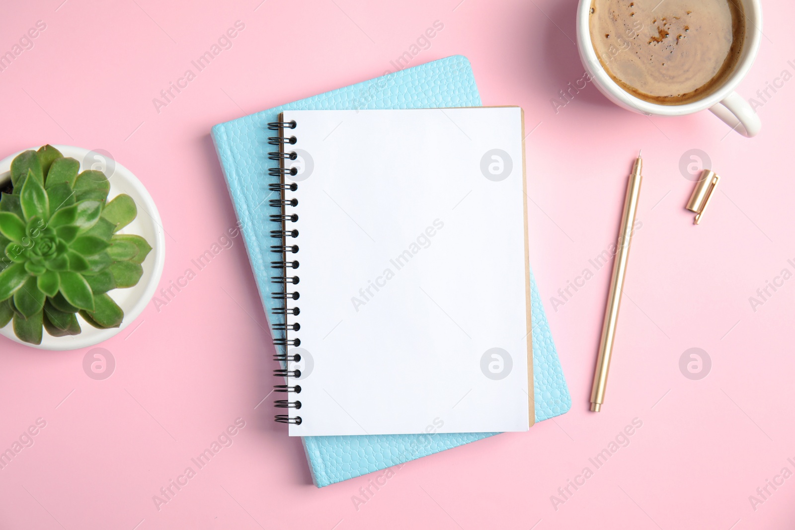 Photo of Flat lay composition with notebooks and coffee on color background