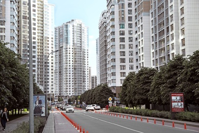 KYIV, UKRAINE - MAY 21, 2019: Beautiful view of modern housing estate in Pecherskyi district on sunny day