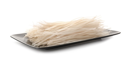 Photo of Plate with raw rice noodles on white background