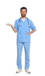 Photo of Full length portraitdoctor in scrubs on white background