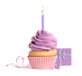 Photo of Delicious birthday cupcake with candle and gift on white background