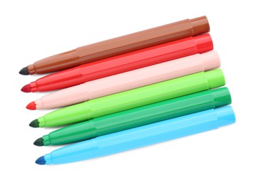 Photo of Many different colorful markers on white background, top view