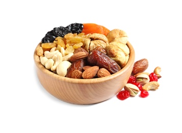 Bowl with different dried fruits and nuts on white background