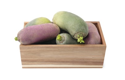 Photo of Purple and green daikon radishes in wooden crate isolated on white