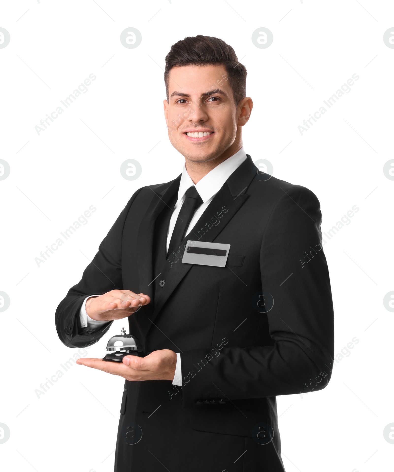 Photo of Happy receptionist in uniform holding service bell on white background