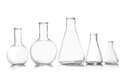 Photo of Group of empty chemistry glassware isolated on white