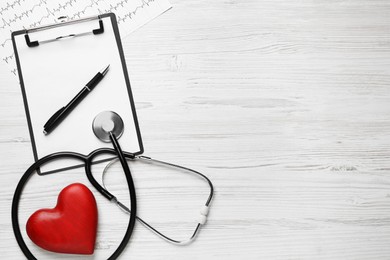 Photo of Flat lay composition with stethoscope and red heart on white wooden table, space for text. Cardiology concept